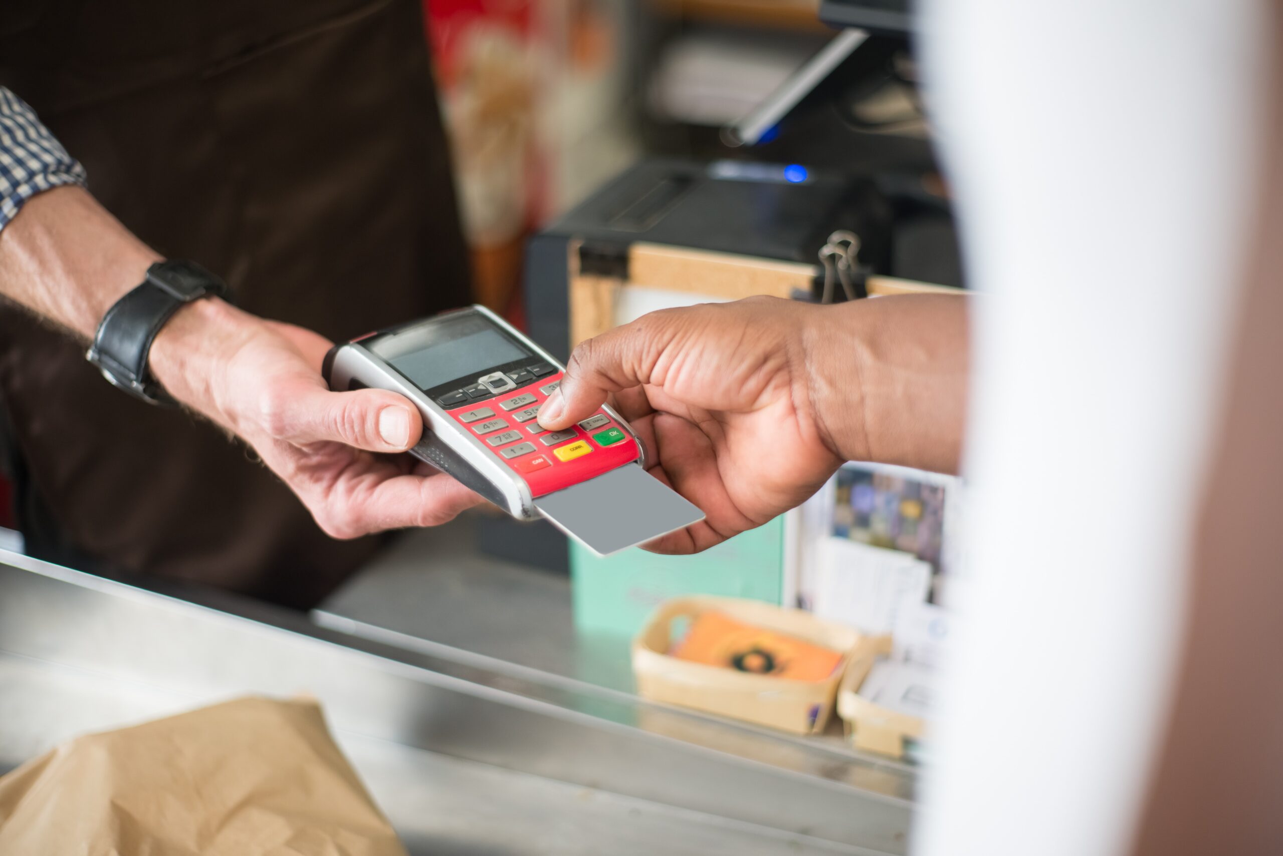 Retail sale using credit card reader at a store